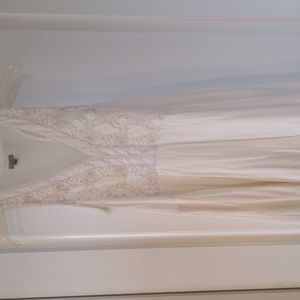 Urban Outfitters white beach cover up with embroidery. Size xs